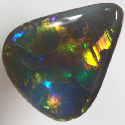 SOLID BLACK OPAL Bright rolling flashes of neon orange and neon green
